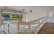 Spacious garage with high ceilings, a ramp, and an open garage door leading to the driveway at 110 Omega Rd, Henderson, NC 27536
