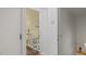 Hallway view of stairs, closet, and garage door at 110 Omega Rd, Henderson, NC 27536