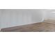 Expansive living room with hardwood floors, offering versatile layout options at 110 Omega Rd, Henderson, NC 27536