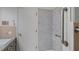 Shower features marble tiling, chrome shower head, and chrome hand rails at 110 Omega Rd, Henderson, NC 27536