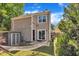 The backyard features a hammock, lush greenery, and a storage shed for outdoor essentials at 121 Drumbuie Pl, Garner, NC 27529