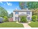 Charming two-story home featuring a well-manicured lawn and traditional architectural details at 121 Drumbuie Pl, Garner, NC 27529