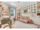 Charming Bedroom with crib, changing table, and decorative accents at 130 Stromness Path, Clayton, NC 27527