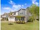 Charming home with a two-car garage, landscaped front yard, and welcoming curb appeal on a beautiful day at 130 Stromness Path, Clayton, NC 27527