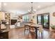 Inviting living room with a fireplace, open shelving, and a comfortable gray sofa at 130 Stromness Path, Clayton, NC 27527