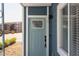 Close-up of a blue apartment unit front door, number one, with keyless entry at 1309 Hudson Ave # D1, Durham, NC 27705