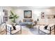 Bright living room featuring modern furniture, stylish decor, and an open layout at 1309 Hudson Ave # D1, Durham, NC 27705