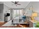 Bright main bedroom with hardwood floors, an area rug, and lots of natural light at 1320 Heritage Hills Way, Wake Forest, NC 27587