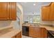 Well-equipped kitchen with ample counter space and stainless steel sink at 135 Cedar Elm Rd, Durham, NC 27713