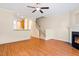 Spacious living room with a cozy fireplace and staircase access at 135 Cedar Elm Rd, Durham, NC 27713