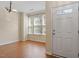 Bright living room featuring hardwood floors and a welcoming entrance at 135 Cedar Elm Rd, Durham, NC 27713