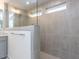 Modern bathroom with glass shower, stylish tiles, and double sink vanity at 14 Relaxing Way, Pittsboro, NC 27312