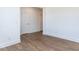 Bright bedroom with white trim, neutral walls, and durable hardwood flooring at 14 Relaxing Way, Pittsboro, NC 27312