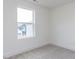 Bright bedroom features a large window, neutral carpet, and crisp white trim at 14 Relaxing Way, Pittsboro, NC 27312