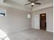Bright bedroom features carpet floors, a ceiling fan, and an ensuite bathroom at 14 Relaxing Way, Pittsboro, NC 27312