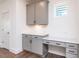 Office area featuring grey cabinets with counter space and drawers at 14 Relaxing Way, Pittsboro, NC 27312