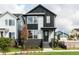 Charming two-story home with a modern black and gray exterior and well-manicured lawn at 14 Relaxing Way, Pittsboro, NC 27312