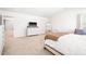Bright bedroom featuring neutral carpeting, white walls, and a comfortable queen-size bed at 1427 Carisbrooke Dr, Mebane, NC 27302