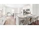 Bright kitchen with granite countertops, seating at bar, and stainless appliances at 1427 Carisbrooke Dr, Mebane, NC 27302