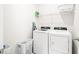 Clean laundry room with new washer, dryer, and storage solutions at 1427 Carisbrooke Dr, Mebane, NC 27302