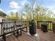Inviting deck with seating and covered grill, perfect for outdoor cooking and relaxation at 14315 Foxcroft Rd, Raleigh, NC 27614