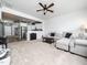 Comfortable living room featuring plush carpet, neutral colors, and an inviting sectional sofa at 14315 Foxcroft Rd, Raleigh, NC 27614