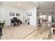 Bright and airy home office featuring neutral carpet, wood floors, and an adjacent sitting room at 14315 Foxcroft Rd, Raleigh, NC 27614