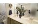 Bathroom featuring double sink vanity, framed mirror, and tile floors at 1505 Sharnbrook Ct, Raleigh, NC 27614