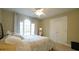Bedroom featuring neutral walls, lots of sunlight, ceiling fan, and carpet floors at 1505 Sharnbrook Ct, Raleigh, NC 27614