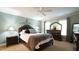 Cozy bedroom featuring a plush bed, dresser, and bedside tables, offering a comfortable and stylish retreat at 1505 Sharnbrook Ct, Raleigh, NC 27614