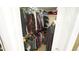 Organized walk-in closet with ample storage, maximizing space and providing easy access to clothing and accessories at 1505 Sharnbrook Ct, Raleigh, NC 27614