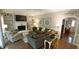 Cozy living room with a fireplace, built-in shelves, and comfortable seating, creating a welcoming space at 1505 Sharnbrook Ct, Raleigh, NC 27614