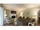 Relaxing living room with a fireplace, built-in bookshelves, and comfortable seating for entertaining at 1505 Sharnbrook Ct, Raleigh, NC 27614
