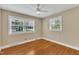 Spacious bedroom featuring hardwood floors and a window at 154 Luther Rd, Raleigh, NC 27610