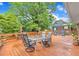 Spacious wooden deck with outdoor seating, perfect for relaxing and entertaining at 154 Luther Rd, Raleigh, NC 27610
