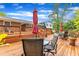 Expansive wooden deck with ample seating, perfect for outdoor gatherings and enjoying the beautiful backyard at 154 Luther Rd, Raleigh, NC 27610