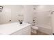 Bathroom featuring white cabinetry, modern fixtures, and a tub with a shower at 156 Southern Middle School Rd, Roxboro, NC 27573