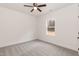 Bright bedroom with neutral carpet, a window view, and a ceiling fan at 156 Southern Middle School Rd, Roxboro, NC 27573