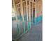 Interior view of a home under construction with exposed wooden framing and concrete floors at 156 Southern Middle School Rd, Roxboro, NC 27573