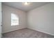 Bright bedroom features neutral walls, carpet and a window with natural light at 182 E Victory View Ter, Smithfield, NC 27577