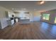 Kitchen and eat-in area featuring an island, white cabinets, and stainless appliances at 182 E Victory View Ter, Smithfield, NC 27577