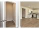 Walk-in pantry adjacent to kitchen features hardwood flooring, shelving and bright lighting at 182 E Victory View Ter, Smithfield, NC 27577