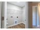 A tidy laundry room with a wire rack and vinyl flooring, ready for appliances at 213 Delma Grimes Rd, Coats, NC 27521