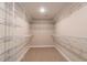 Walk-in closet with extensive metal shelving provides ample storage at 213 Delma Grimes Rd, Coats, NC 27521