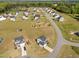 An aerial view shows the property and neighborhood layout at 220 Brisbane Dr, Zebulon, NC 27597