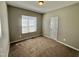 Cozy bedroom with neutral walls, carpet, and natural light from a window at 226 Kandypoo Dr, Four Oaks, NC 27524