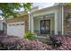 Inviting front entrance with stone accents, double doors, and decorative wreaths at 2307 Carriage Oaks Dr, Raleigh, NC 27614