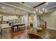 Spacious open concept kitchen with stainless steel appliances, wine fridge, breakfast bar, and hardwood floors at 2307 Carriage Oaks Dr, Raleigh, NC 27614