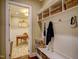 Convenient mudroom with built-in storage, bench, and easy access to a private home office at 2307 Carriage Oaks Dr, Raleigh, NC 27614