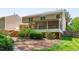 Inviting backyard featuring a screened porch, wooden deck, and professionally landscaped grounds at 2412 Castleburg Dr, Apex, NC 27523